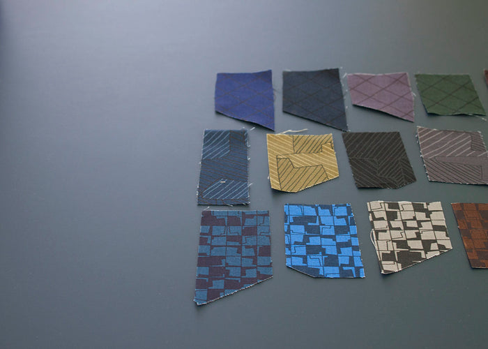 swatches of fabrics on a dark background